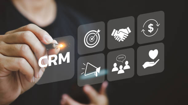 istock Businessman touching CRM Customer Relationship Management on virtual screen. Community Marketing, Business development concept. 1494150133