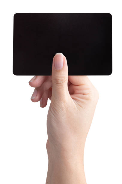 istock Woman hand hold black empty card isolated on white background. 1494153428