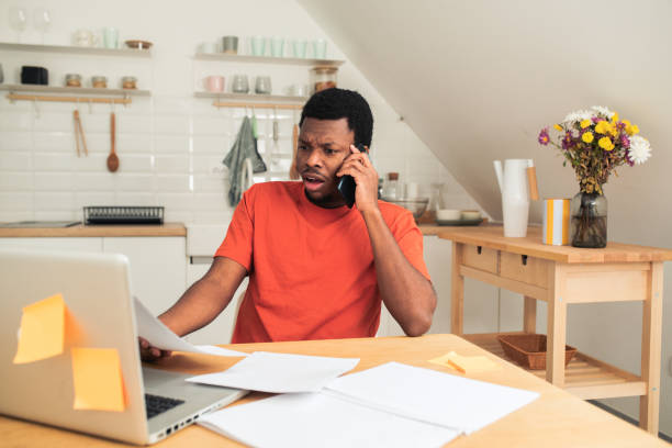istock Young African-American designer working at his home office 1494153625