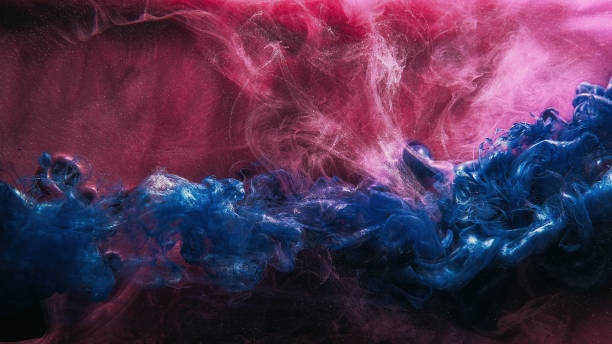 istock Glitter fluid ink water shot paint blend pink blue 1494154867