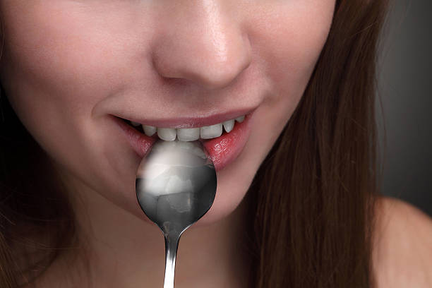 istock beauty girl with spoon 149415785