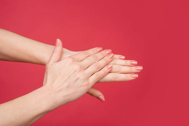 istock female hands with manicure and smooth skin 1494159548