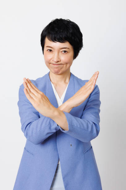 istock Mature Japanese woman with No gesture 1494159574
