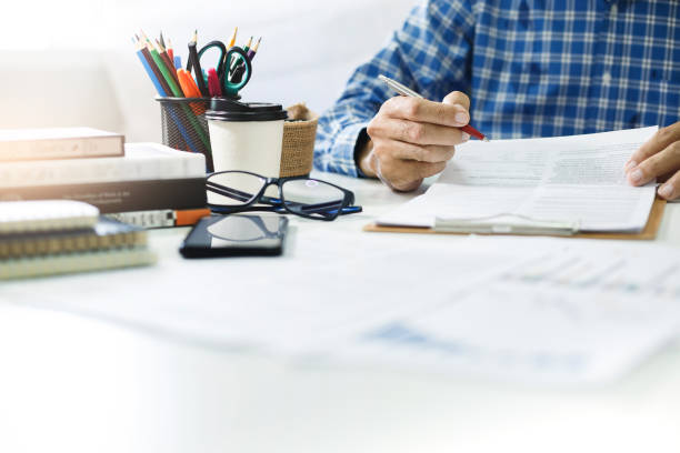 istock business person working in office 1494159721