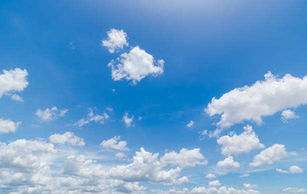 istock Panoramic view of clear blue sky and clouds, Blue sky background with tiny clouds. White fluffy clouds in the blue sky. 1494162243