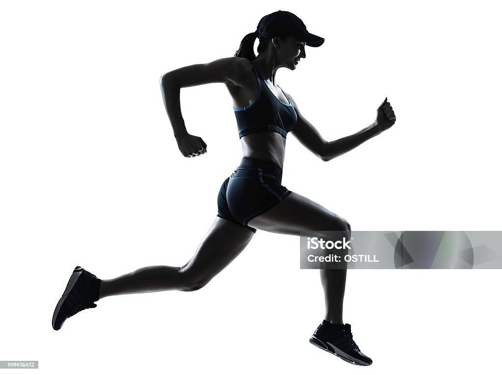 Uma silhueta de um Atleta de pista feminina - Foto de stock de Correr royalty-free