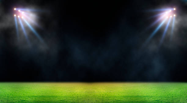 istock Green soccer field, bright spotlights, 1494166181