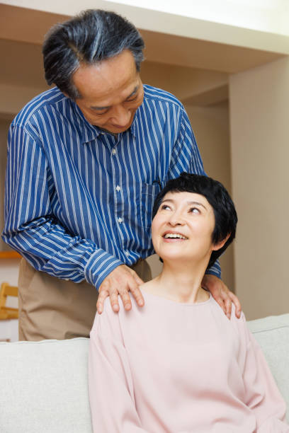 istock Mature Japanese man doing massage for his wife 1494166764
