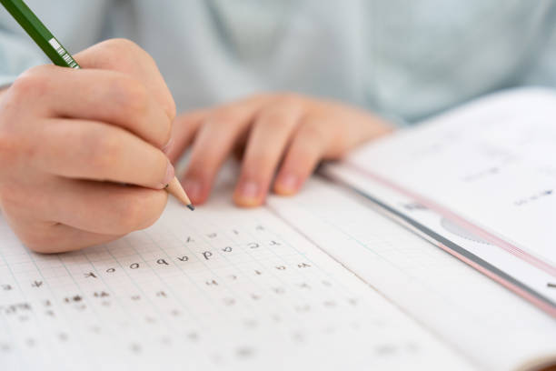 istock Japanese girl studying at home 1494168522