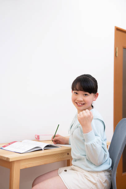 Japanese girl studying at home