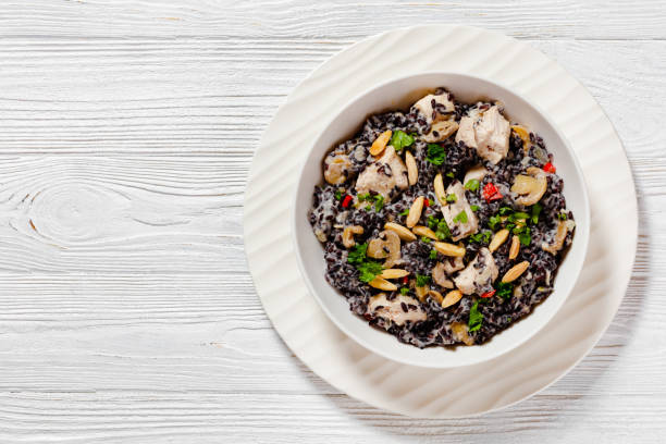istock black rice with cream, chicken, mushrooms, almonds 1494171941