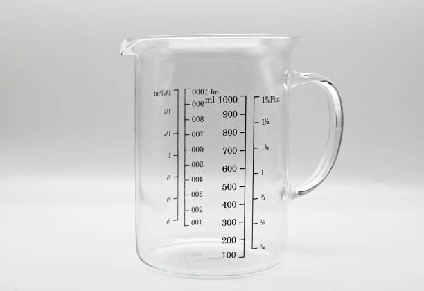 istock Empty glass measuring cup isolated on white background 1494180791