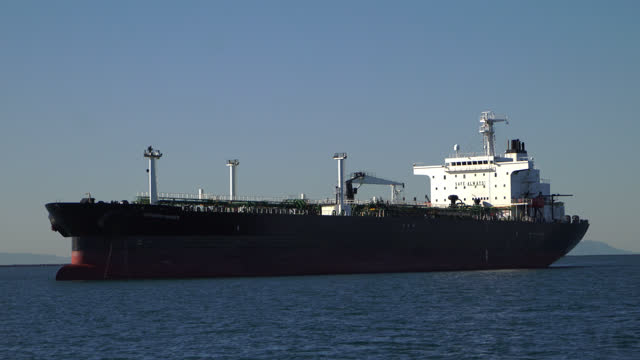 In the busy maritime hub of Los Angeles, oil tankers anchored, ready to load or unload their valuable petroleum cargo.