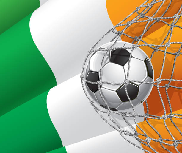 fußball ziel auf irische fahne. - irish culture republic of ireland irish flag sport stock-grafiken, -clipart, -cartoons und -symbole