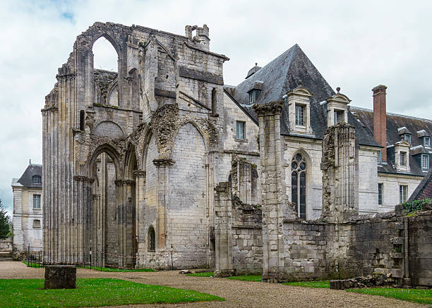 Ruins of the Saint Wandrille abbey in northern France Ruins of the Saint Wandrille abbey in northern France abbey stock pictures, royalty-free photos & images