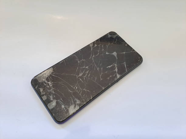 istock black smartphone with a broken screen isolated on white background 1494188449