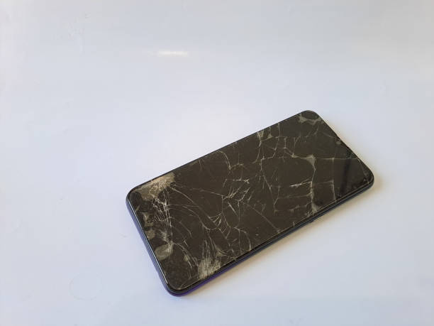 istock black smartphone with a broken screen isolated on white background 1494188519