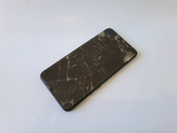 istock black smartphone with a broken screen isolated on white background 1494188528