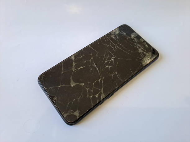 istock black smartphone with a broken screen isolated on white background 1494188534