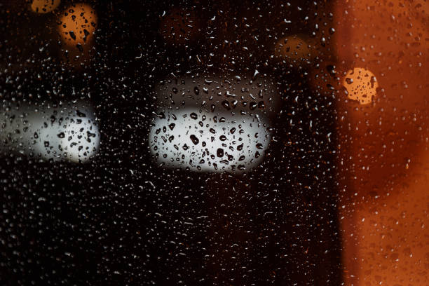 istock Water drops on glass in darkness 1494189388