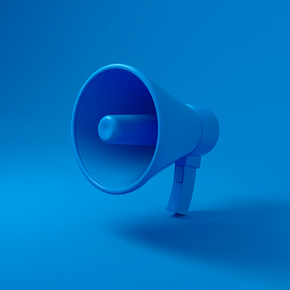 Megaphone speaker on blue background. 3d rendering.