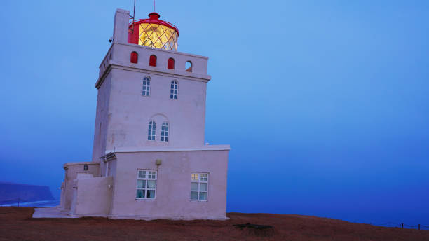 istock Dyrholaey lighthouse on arctic coastline 1494197527