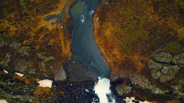istock Drone shot of nordic oxarafoss waterfall 1494197746
