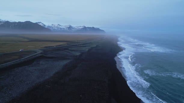 istock Drone shot of nordic black sand beach 1494197777
