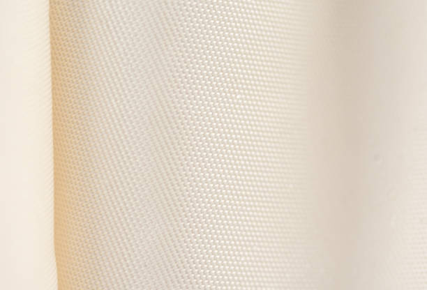 The curtain, beige or light brown blackout fabric, light-blocking fabric