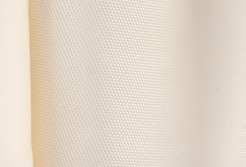 The curtain, beige or light brown blackout fabric, light-blocking fabric