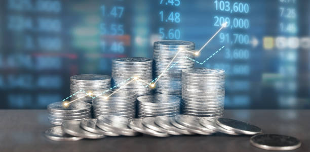 istock Stack of coin with trading graph, financial investment c 1494203837