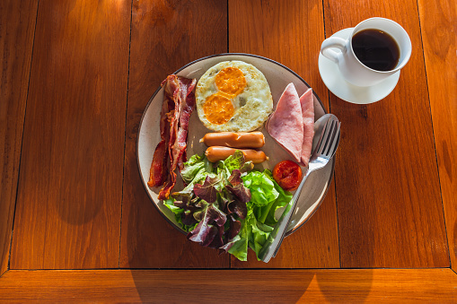 Sunny side up Eggs with Haggis,Blood Pudding, Sausage, Bacon, Beans, Mushrooms, Toast and Tomatoes-Photographed on Hasselblad H3D-39mb Camera