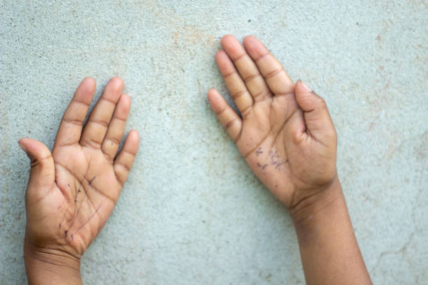 istock ten fingers and two hands placed on the wall background On the contrary 1494205071