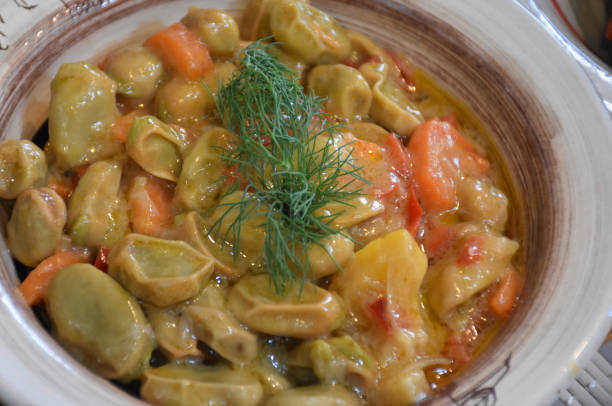 istock Aegean style green broad bean dish with carrot 1494212155