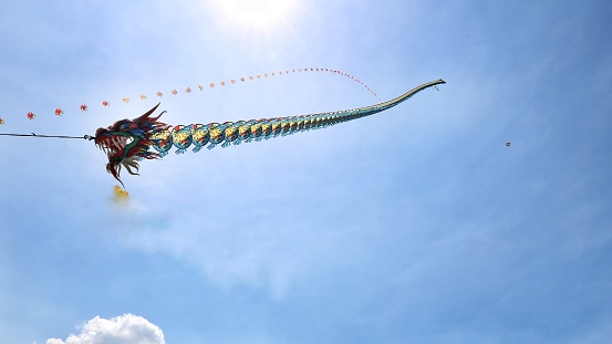 dragon kite toys flying in the blue sky