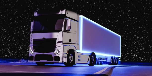 istock Modern large truck driving on road under starry sky 1494219721