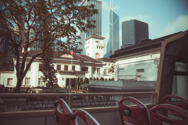 istock Old building with trees facing streets in Hong Kong 1494219750