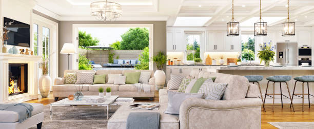 istock Open plan living room with white kitchen in a beautiful home 1494221174