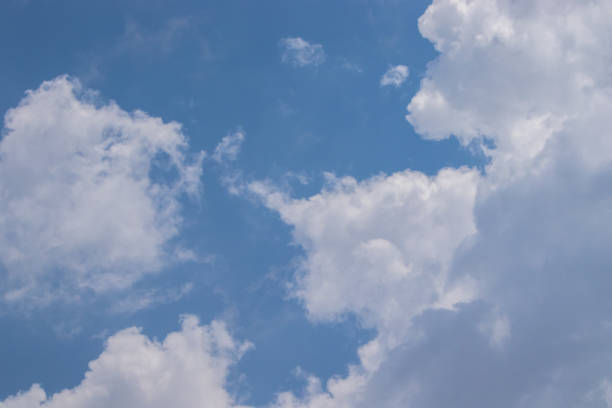 istock Vibrant Azure Sky and Fluffy Clouds 1494221661
