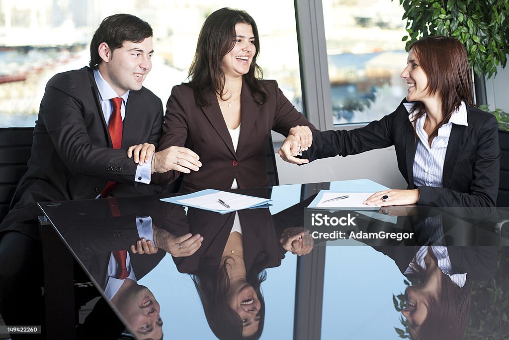 Business conciliation Businesswoman mediating and making business conciliation possible Office Stock Photo