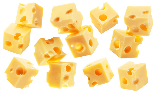 Collection of Emmental or Maasdam cheese cubes flying in the air on white background. Clipping path.