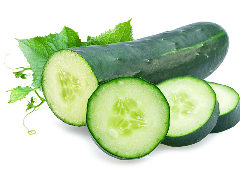 Raw cucumber and cucumber slices isolated on white background.