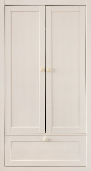 Wooden wardrobe cabinet doors with white handles. This file is cleaned and retouched.