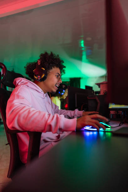 istock Gamer is playing a video game from his PC 1494226459