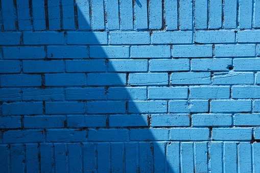 Old blue wall background with copy space