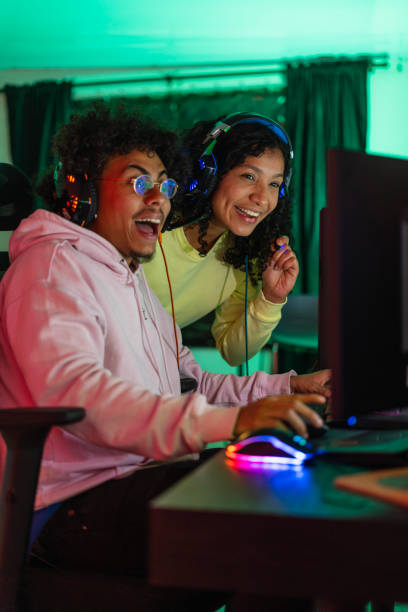 istock Gamers are enjoying while playing a video game at home 1494228367