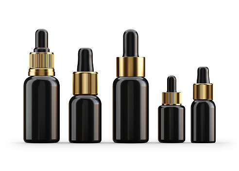 Serum dropper black luxury bottles on white background