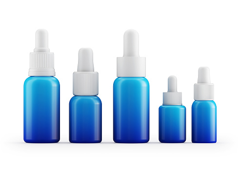 Serum dropper blue bottles on white background