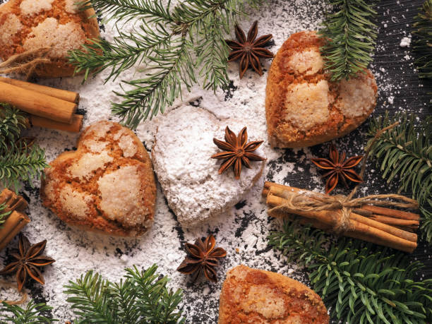 istock Winter holiday concept - cinnamon, star anise, cookies, spruce branches 1494242420