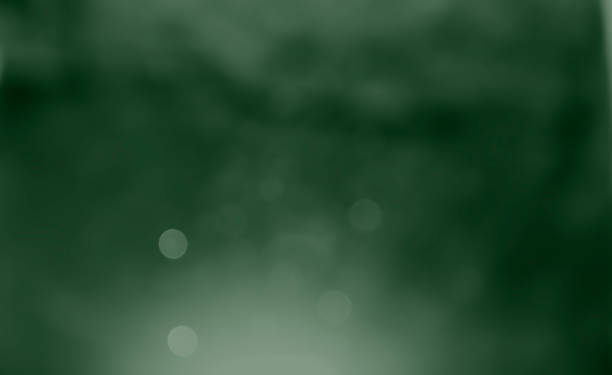 istock Green bokeh glitter wallpaper background. 1494245091
